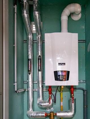 Chaudière de 20 kW assurant le chauffage et l'ECS de huit logements